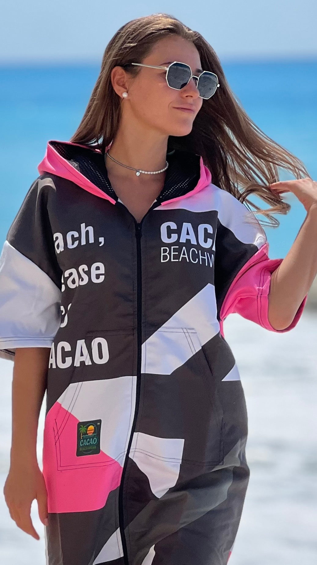 Solar Vibes Pink women’s beach poncho NanoDry Ultra™ towel with hood, zipper and pockets – CACAO Beachwear™