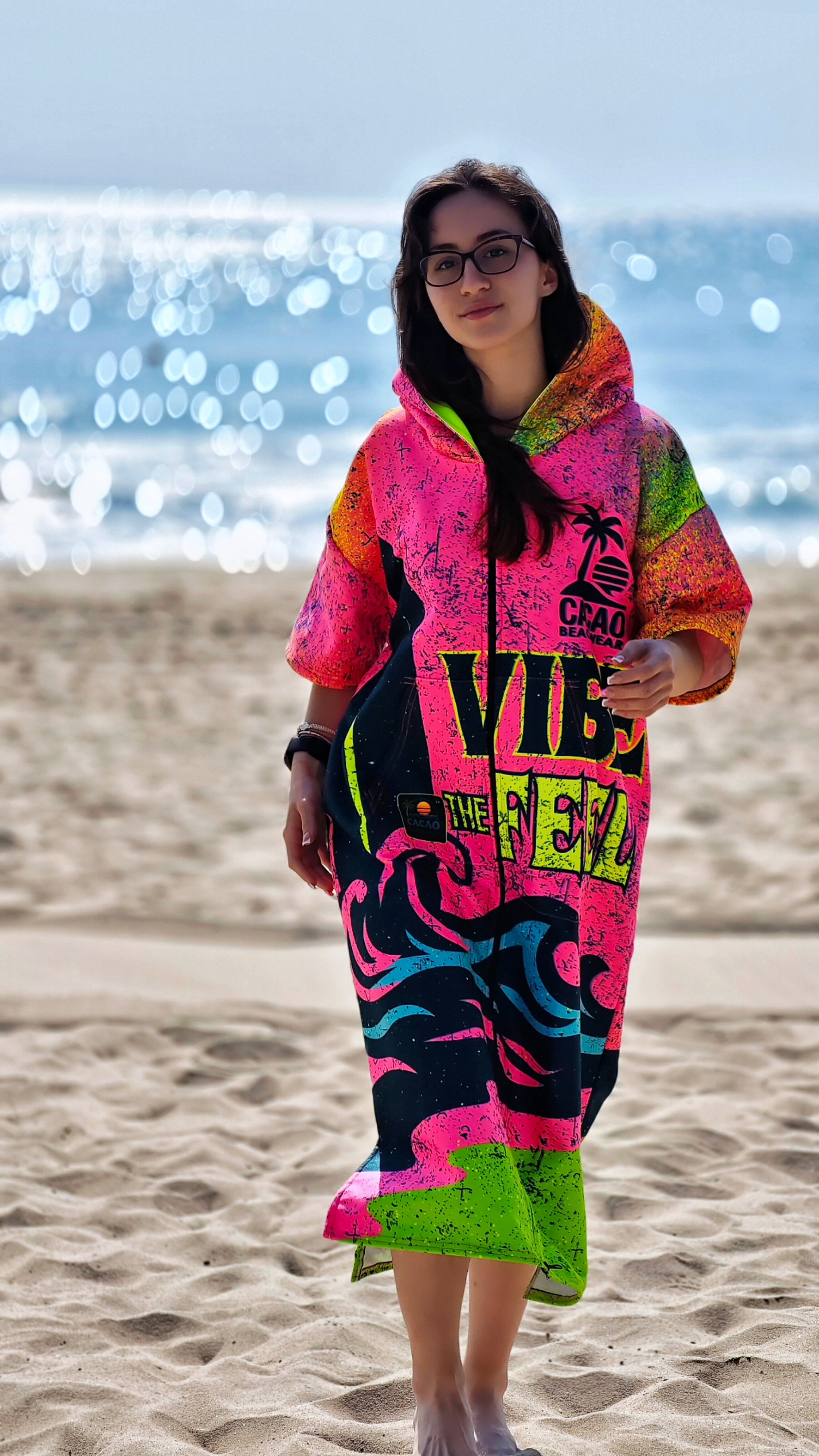 Paradise women’s beach poncho towel with hood, zipper and pockets – CACAO Beachwear™