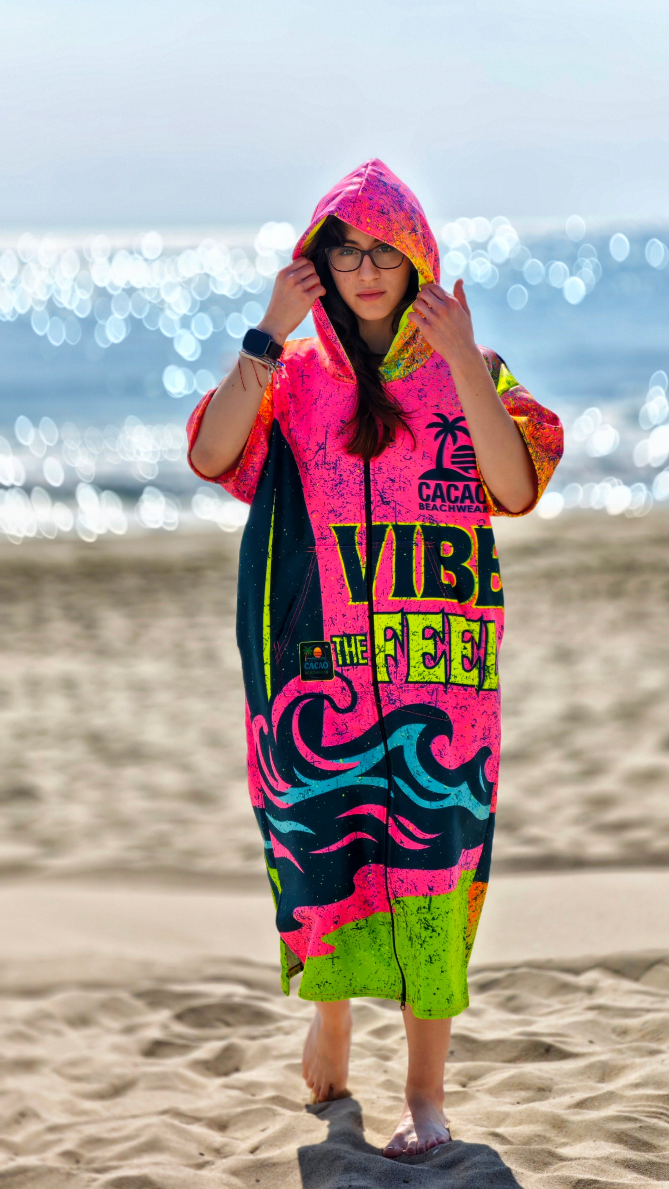 Paradise women’s beach poncho towel with hood, zipper and pockets – CACAO Beachwear™