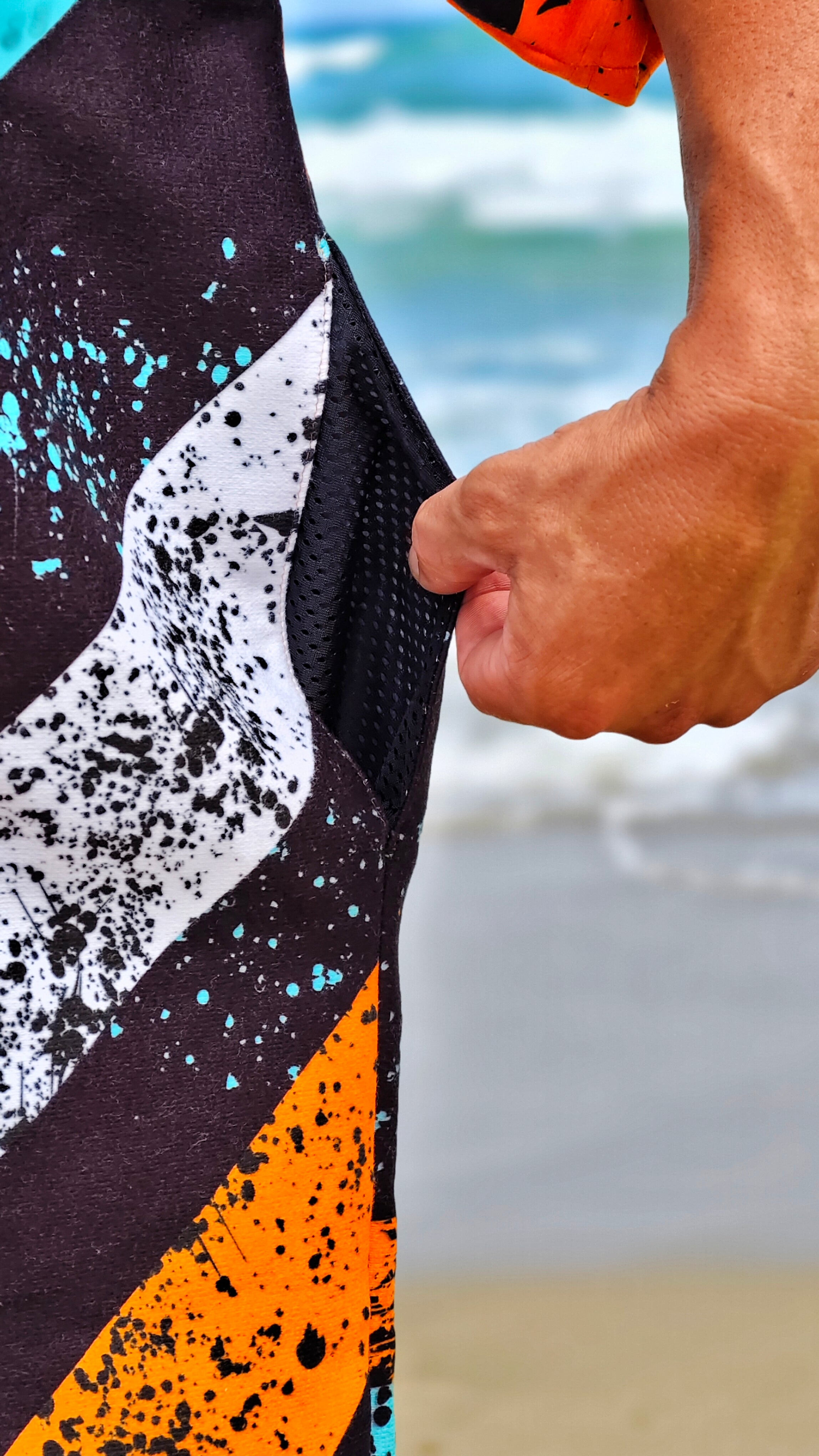 Orange men’s beach poncho towel with hood, zipper and pockets – CACAO Beachwear™