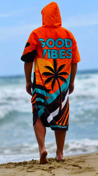 Toalla poncho de playa naranja para hombre con capucha, cremallera y bolsillos – CACAO Beachwear™