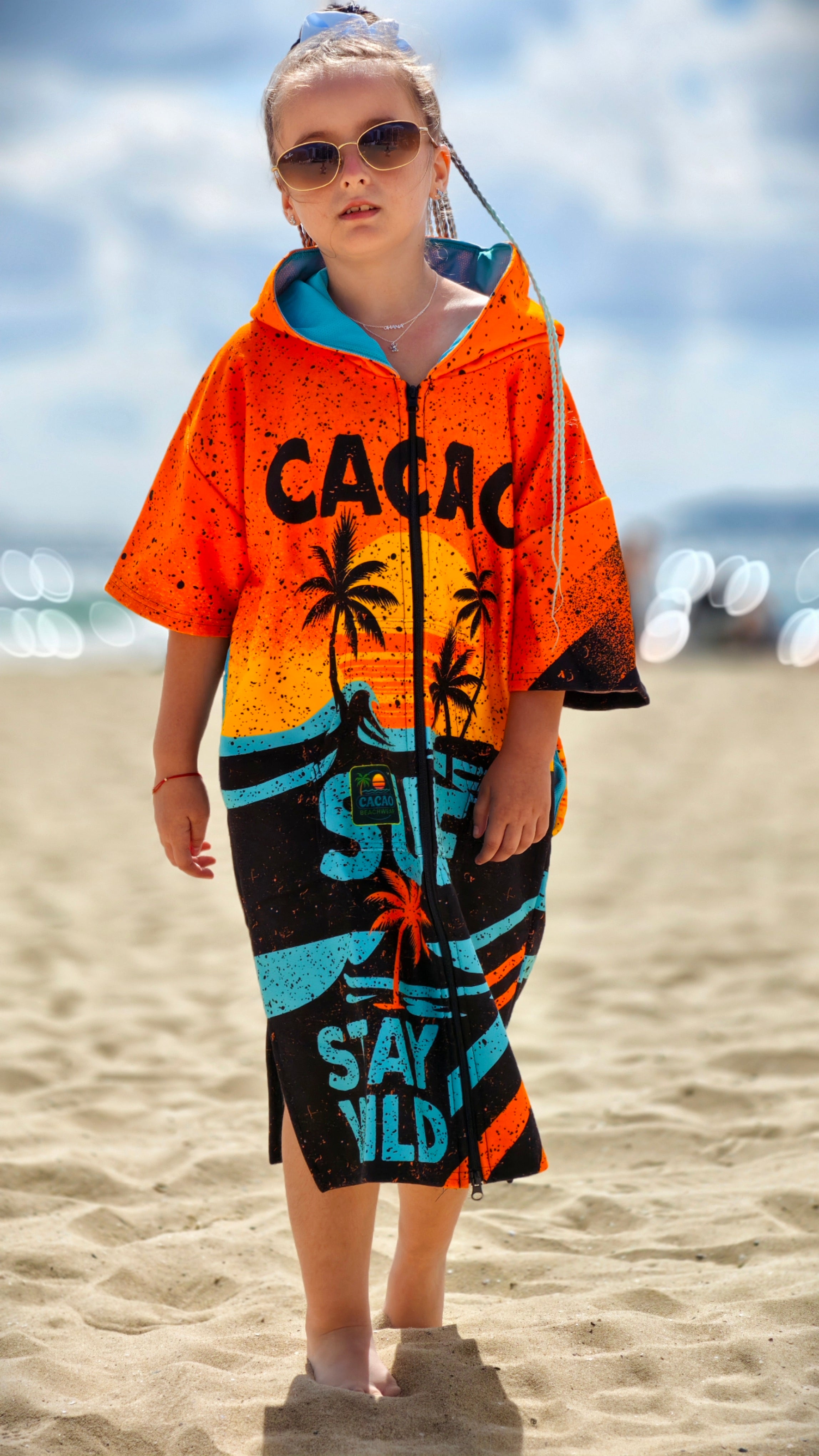 Orange children’s beach poncho towel with hood, zipper and pockets – CACAO Beachwear™