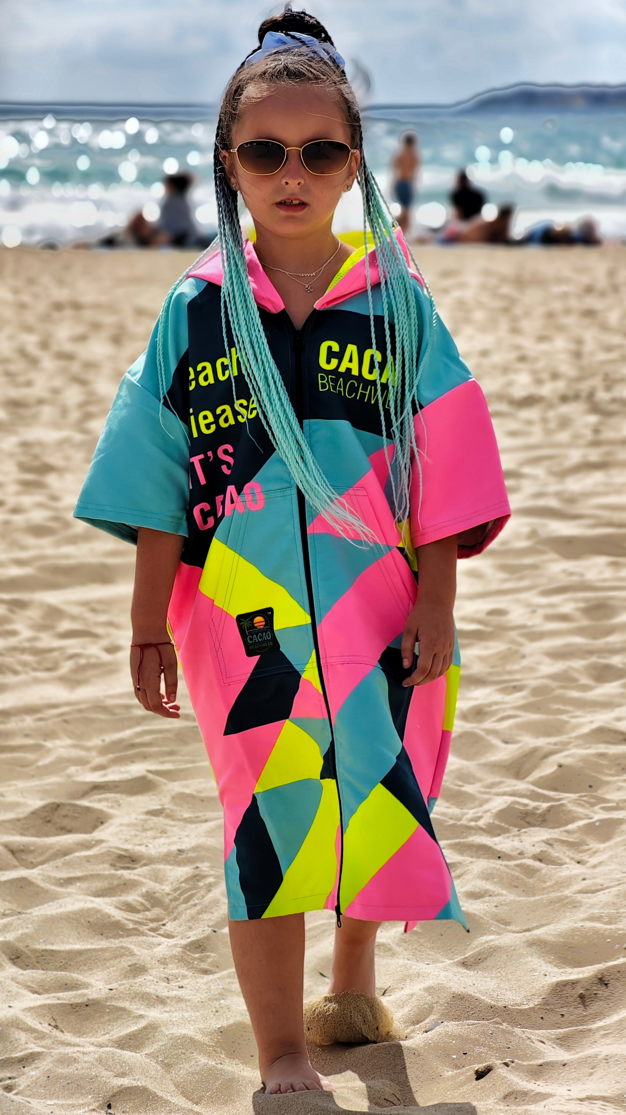Colorful Solar Vibes children’s beach poncho NanoDry Ultra™ towel with hood, zipper and pockets – CACAO Beachwear™