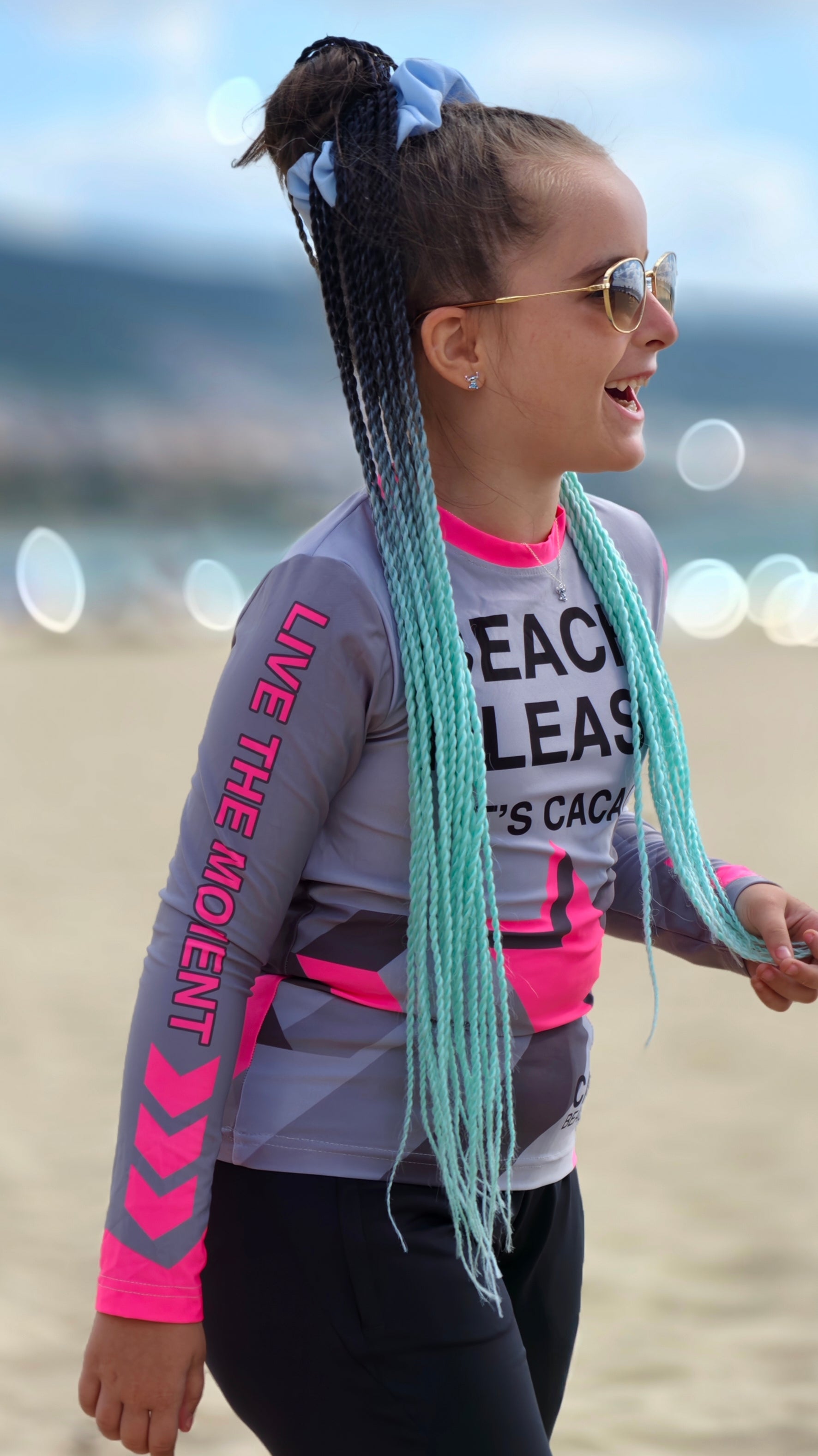 Solar Vibes Pink children’s rashguard CACAO Beachwear™️ with UV Protection