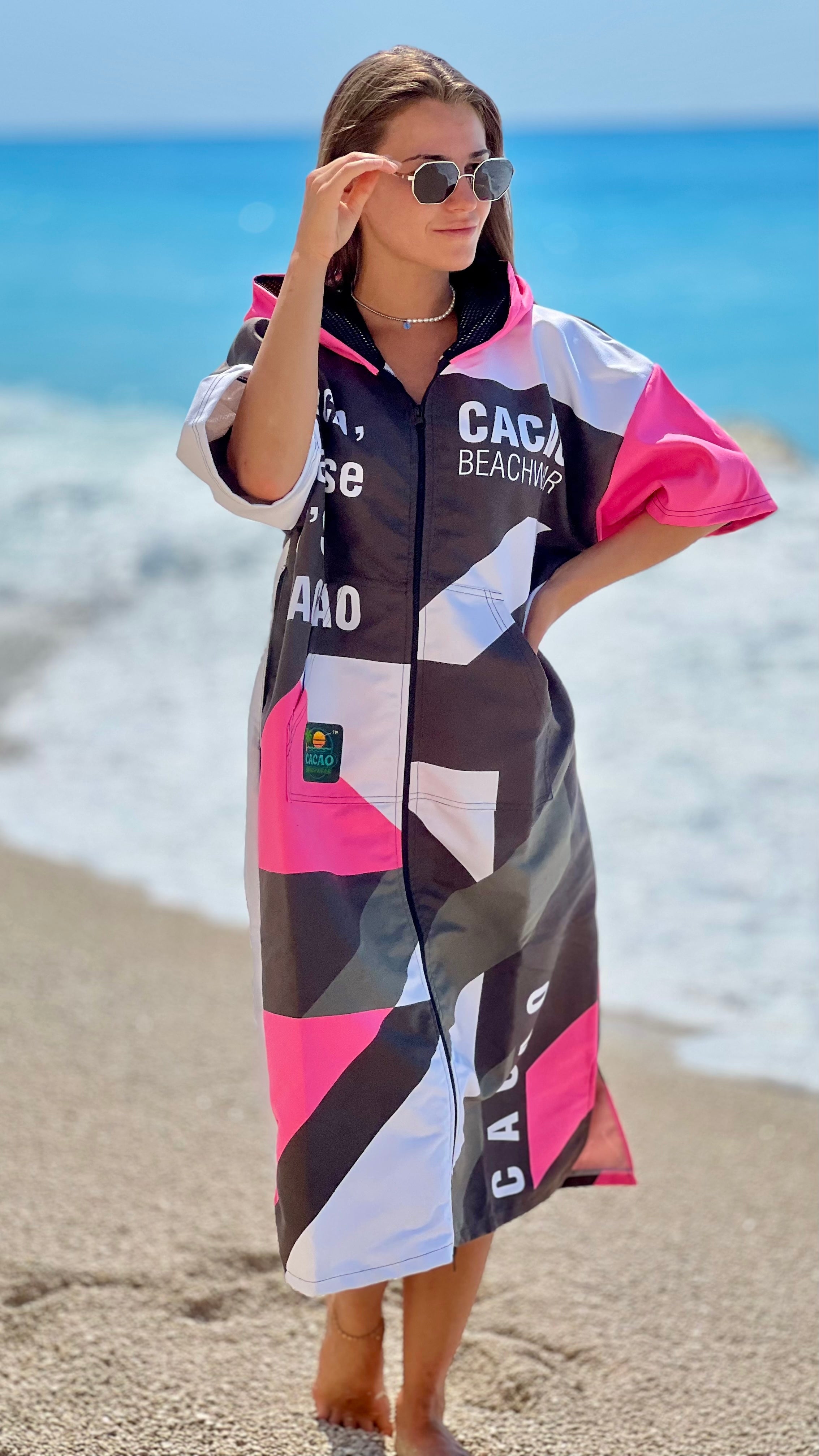 Solar Vibes Pink women’s beach poncho NanoDry Ultra™ towel with hood, zipper and pockets – CACAO Beachwear™