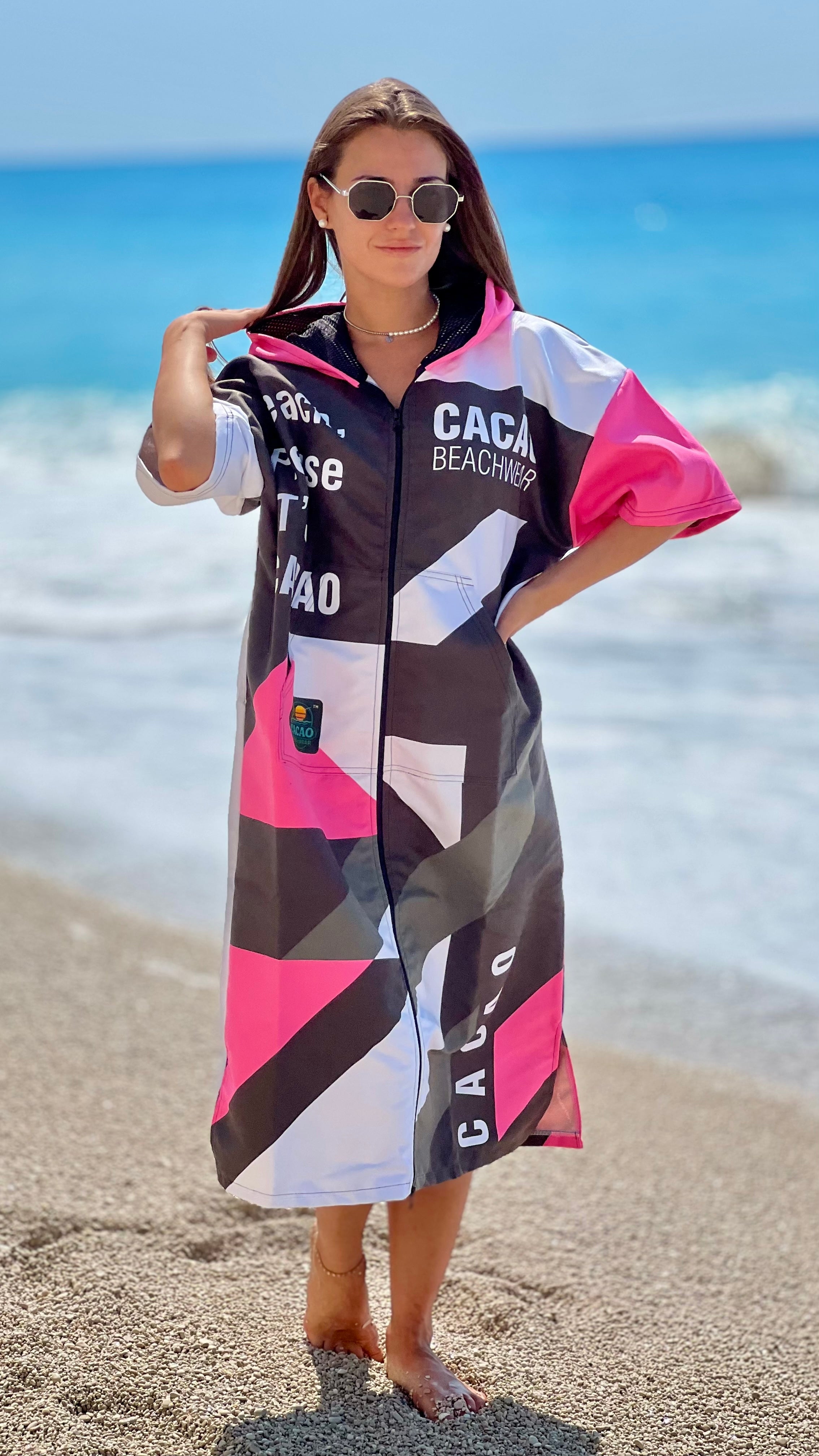 Solar Vibes Pink women’s beach poncho NanoDry Ultra™ towel with hood, zipper and pockets – CACAO Beachwear™