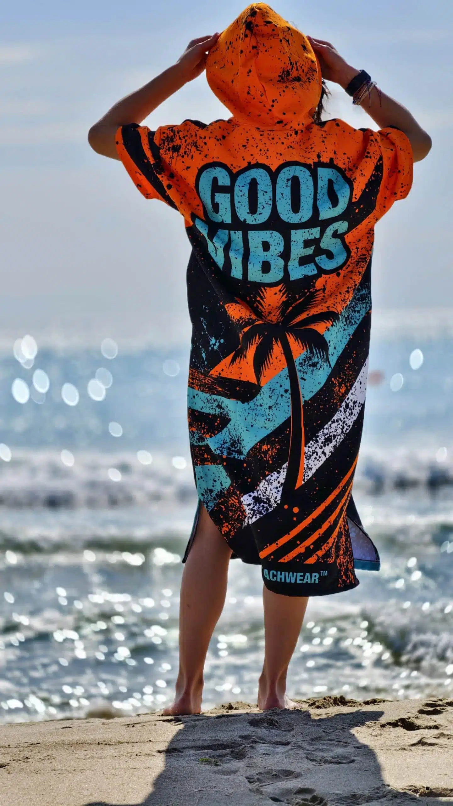 Blue Spirit women’s beach poncho towel with hood, zipper and pockets – CACAO Beachwear™